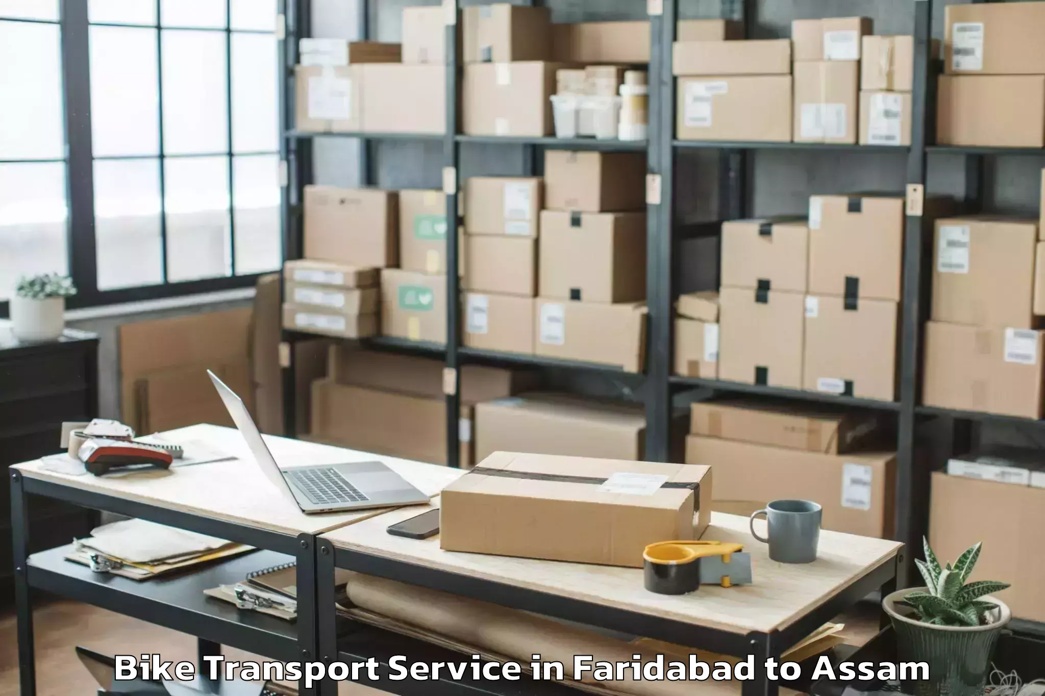 Top Faridabad to Pachim Nalbari Bike Transport Available